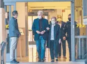  ?? DAMIAN DOVARGANES/AP ?? Former President Bill Clinton and former first lady Hillary Clinton leave the hospital Sunday.