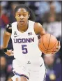  ?? Jessica Hill / Associated Press ?? UConn’s Crystal Dangerfiel­d dribbles during an exhibition game earlier this month.