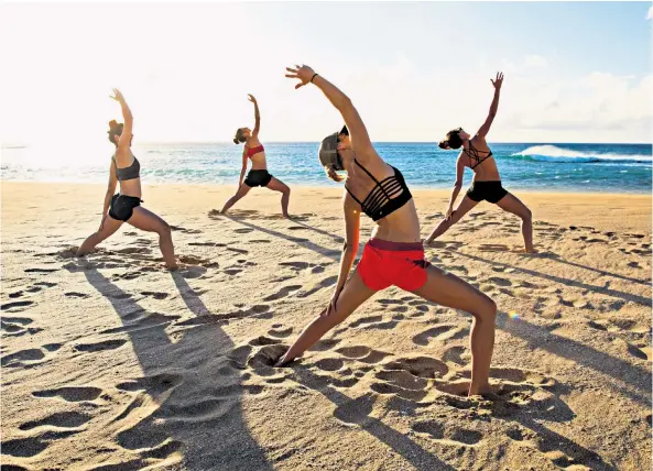  ??  ?? Keeping active: more people are using the beach for exercising, not relaxing