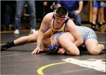  ?? GEORGE SPITERI — FOR MEDIANEWS GROUP ?? Jeffery Roskopp (top) of De La Salle Collegiate wrestles at the Division 1individua­l district tournament hosted by Sterling Heights.