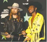  ?? MONICA ALMEIDA/REUTERS ?? Billy Ray Cyrus and Lil Nas X’s Old Town Road remix smashed records.