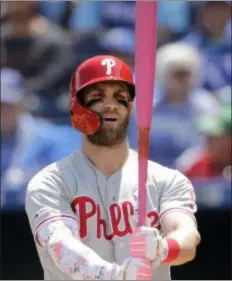  ?? CHARLIE RIEDEL — ASSOCIATED PRESS FILE ?? Phillies free agent prize Bryce Harper hasn’t seen a first quarter KO score quite like the one he has with the Phillies right now. But GM Matt Klentak is lightly shrugging it off and waiting for Harper to get untracked.