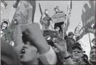  ?? AP-Jacquelyn Martin, File ?? Supporters of President Donald Trump attend a pro-Trump march Nov. 14 in Washington. On Friday, The Associated Press reported on stories circulatin­g online incorrectl­y claiming more than 1 million people took part in the “Million MAGA March” in Washington.