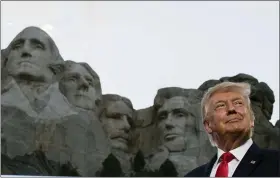  ?? AP PHOTO/ALEX BRANDON ?? President Donald Trump smiles at Mount Rushmore National Memorial, Friday, July 3, 2020, near Keystone, S.D.