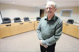  ?? JASON BAIN EXAMINER ?? Douro-Dummer clerk/CEO Dave Clifford poses in the township’s council chamber in Warsaw on Monday. He will be honoured there Tuesday for his 50 years of service in the roles.