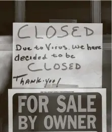  ?? Paul Sancya / Associated Press ?? This small business in Grosse Pointe Woods, Mich., has gone under. Meanwhile, federal business relief loans are snagged.