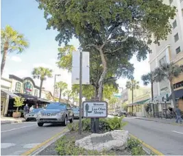  ?? SUSAN STOCKER/STAFF FILE PHOTO ?? Currently, visitors and employees headed to Las Olas Boulevard park anywhere they can. That would end if some neighborho­ods become permit-parking-only districts.