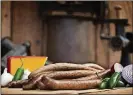  ??  ?? The jalapeno cheese sausage from Stripling’s combines two favorite sausage toppings and makes it easy to please those who like a little heat with their meat.