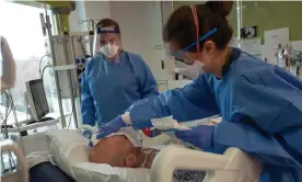  ?? Photograph: Andy Hall/The Observer ?? Medical staff treat a Covid patient at the intensive care unit at King’s College hospital in London last week.