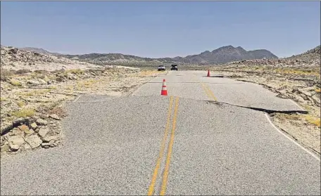  ?? California Geological Survey ?? A PAVED road in Naval Air Weapons Station China Lake was shifted 8 feet by the fault that ruptured in the July 5 Ridgecrest quake.