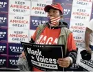  ?? ADAM CAIRNS/COLUMBUS DISPATCH ?? Stephanie Thomas of Columbus attends a Black Voices for Trump rally in Westervill­e on Wednesday.