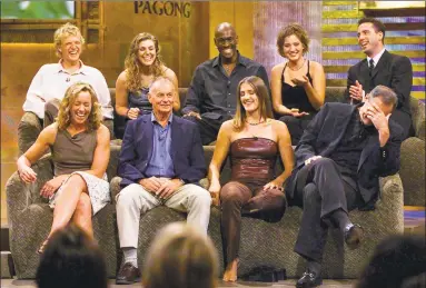  ?? Kevork Djansezian / Associated Press ?? In this Aug. 23, 2000, file photo, a group of “Survivor” contestant­s, break into laughter during a live town hall meeting at CBS Studios in Hollywood in Los Angeles. Survivors are, from left, bottom row, Susan Hawk, Rudy Boesch, Kelly Wigleswort­h and Richard Hatch, covering his face, top row, Greg Buis, Jenna Lewis, Gervase Peterson, Colleen Haskell and Sean Kenniff. Boesch, a retired toughasnai­ls Navy SEAL and fan favorite on the inaugural season of “Survivor,” died Friday after a long battle with Alzheimer's disease. He was 91.