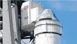  ?? TERRY RENNA/AP ?? Boeing’s first Starliner spacecraft on top of a United Launch Alliance Atlas 5 rocket at the Cape Canaveral Air Force Staton in Cape Canaveral in December.