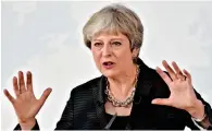  ?? AFP ?? PM’S PITCH: May gestures during her speech in Florence. —
