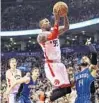  ?? FRANK GUNN/ASSOCIATED PRESS ?? Delon Wright (55) and Toronto had their way offensivel­y with D.J. Augustin (14) and Orlando.