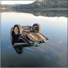  ?? Picture: SUPPLIED ?? CLOSE CALL: Early morning joggers yesterday came across a partially submerged car upside down in the Quenera River at Bonza Bay mouth. East London police spokeswoma­n Warrant Officer Hazel Mqala said a man arrived at the Beacon Bay police station on...