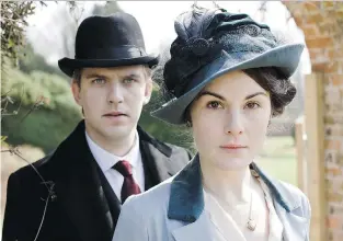  ?? MA S T E R P I E C E / T H E A S S O C I AT E D P R E S S ?? Dan Stevens, left, as Matthew Crawley, and Michelle Dockery as Lady Mary Crawley in Downton Abbey. The series is not slated to survive beyond its upcoming sixth season.