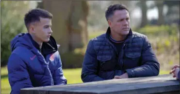  ?? ?? DETERMINED: James and dad Michael in the new documentar­y, Football is for Everyone