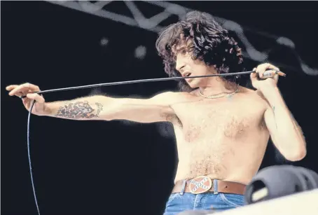  ?? Picture: Getty. ?? Bon Scott performing with AC/DC at Wembley Stadium on August 18 1979.