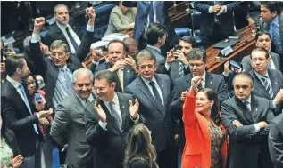  ?? – AFP ?? IMPEACHMEN­T TRIAL: Brazilian senators are seen after the voting in the impeachmen­t trial of suspendend president Dilma Rousseff at the Senate in Brasilia, on Wednesday.