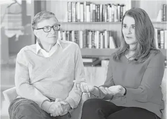  ?? Ted S. Warren / Associated Press ?? Microsoft co-founder Bill Gates and his wife, Melinda, the world’s top philanthro­pists, are focusing on U.S. poverty. “We are not seeing the mobility out of poverty in the same way in the United States as it used to exist,” Melinda Gates says.