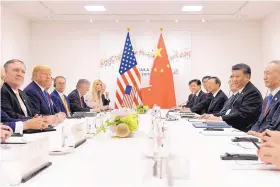  ?? SUSAN WALSH/ASSOCIATED PRESS ?? President Donald Trump meets with Chinese President Xi Jinping, second from right, during a meeting in Osaka, Japan, on Saturday.