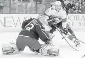  ?? PAUL VERNON/AP ?? Columbus goalie Sergei Bobrovsky stops a shot from Florida Panthers forward Aleksander Barkov.