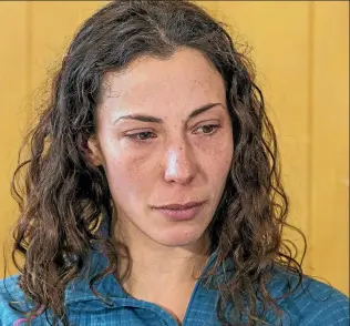  ?? PHOTO: IAIN McGREGOR/FAIRFAX NZ ?? Pavlina Pizova reads a statement after being rescued from the McKenzie hut on the Routeburn track near Queenstown where she was living for weeks after her partner died.