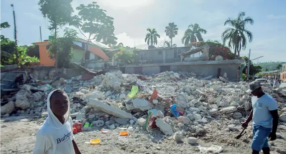  ??  ?? Les Cayes A Les Cayes, centro di centomila abitanti a pochi chilometri da Saint-Louis du Sud, epicentro del terremoto, si conta il maggior numero di vittime