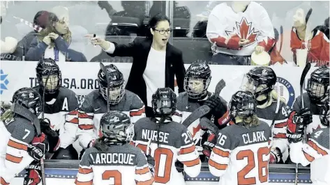  ?? THE ASSOCIATED PRESS FILES ?? Team Canada head coach Laura Schuler instructs her team in a game against the United States on Dec. 15. Schuler will become the first former player to coach Canada’s Olympic women’s hockey team when the take the ice in Pyeongchan­g, South Korea.