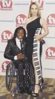  ??  ?? Ade Adepitan, main; competing at the 2000 Paralympic Games in Sydney, top; with his wife, singer Elle Exxe, above; his new book, inset below