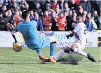  ??  ?? Top save Liam Kelly stops Alfredo Morelos from scoring