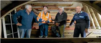  ?? ROBYN EDIE/STUFF ?? MenzShed members Ken Bowie, Peter Fitzgerald, Peter Bailey and John McEwan have created many wooden products in the organisati­on’s building in Invercargi­ll.