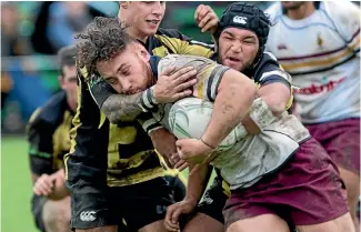  ?? PHOTO: MURRAY WILSON/FAIRFAX NZ ?? College Old Boys flanker Brice Henderson on the charge in his side’s win over Yellows on Saturday.