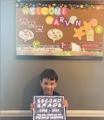  ?? Contribute­d by Diana Christophe­r ?? Brayden Christophe­r, 7, started school virtually this week at Marvin Elementary School in Norwalk.