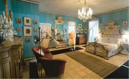  ?? MIKE STOCKER/SUN SENTINEL PHOTOS ?? The master bedroom at Fort Lauderdale’s Bonnet House, which is providing exclusive looks at normally closed areas, including Evelyn and Frederic Bartlett’s private living quarters.