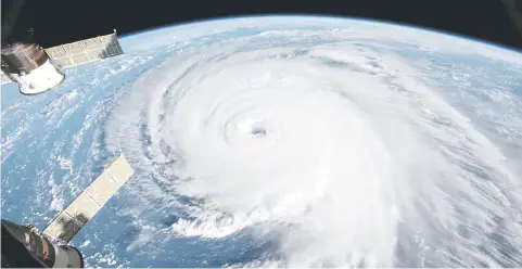  ??  ?? A view of Hurricane Florence is shown churning in the Atlantic Ocean in a west, north-westerly direction heading for the eastern coastline of the United States, taken by cameras outside the Internatio­nal Space Station, September 12. — NASA/Handout via Reuters photo