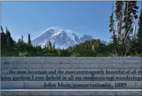  ?? JOHN CHAO VIA AP ?? This photo provided by John Chao shows the Muir Steps, Paradise area inside Mount Rainier National Park in Washington. Steps engraved with a quote from famed naturalist John Muir lead up to the Paradise area trails in the park. These are popularly...