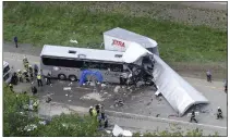  ?? DAVID KIDWELL — AP ?? A fatal collision of a tractor-trailer and a tour bus on Interstate 380 near Mount Pocono on June 3, 2015.