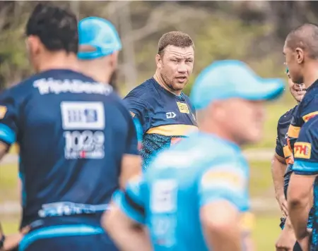  ??  ?? Shannon Boyd at his first Titans session. And (below right) with Bryce Cartwright and Morgan Boyle. Pictures: GOLD COAST TITANS