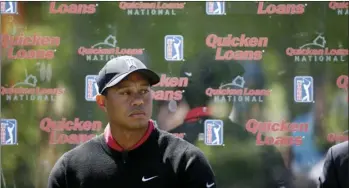  ??  ?? In this May 16, 2016, file photo, Tiger Woods pauses during a Quicken Loans National golf tournament media availabili­ty on the 10th tee at Congressio­nal Country Club in Bethesda, Md. AP PHOTO/ALEX BRANDON