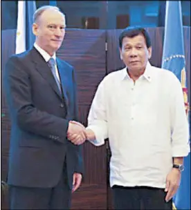  ??  ?? Russian Federation Security Council Secretary Nikolai Patrushev to the presidenti­al guest house in Davao City the other night. Patrushev, a close friend of Russian President Vladimir Putin, heads a 50-member delegation on a three-day visit to the city.