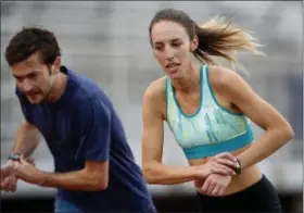  ?? CARLOS GONZALEZ — STAR TRIBUNE VIA AP ?? In this photo, Gabriele Grunewald trains at Macalester College in St. Paul, Minn. St. Paul, Minn. This month, middle-distance runner Gabriele Grunewald has reserved for racing. Next month, chemo. She’s delaying her treatments just a little bit in her...