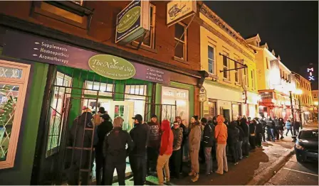  ?? — Reuters ?? Here for the weed: Canadians lining up outside a store selling marijuana in St John’s after the new law took effect.