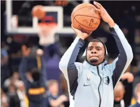  ?? MAX GERSH/THE COMMERCIAL APPEAL ?? Grizzlies' Josh Jackson warms up on Jan. 28, before a game against the Nuggets at Fedexforum in downtown Memphis.