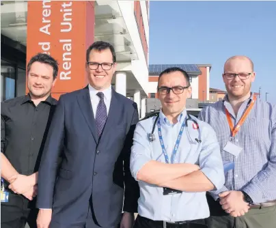  ??  ?? Llanelli AM Lee Waters has visited Morriston Hospital in Swansea where the renal unit has made pioneering advances in the use of digital technology. He is pictured with, from left: consultant renal pharmacist Chris Brown, renal consultant James Chess and renal IT engineer Mike Wakelyn.