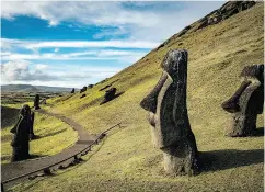  ?? JOSH HANER / THE NEW YORK TIMES FILES ?? Moai statues at Rano Raraku on Easter Island, where coasts are being eaten away by rising sea levels.