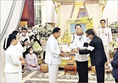  ?? CPP VIA FACEBOOK ?? Prime Minister Hun Sen receives the royal decree from Minister of the Royal Palace Kong Sam Ol on May 7.