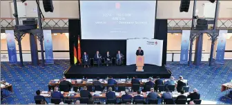  ?? REN PENGFEI / XINHUA ?? The “Invest in China” Germany Session is held in Stuttgart in early April. The event attracted more than 300 German business representa­tives.