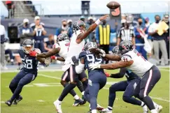  ?? AP Photo/Mark Zaleski ?? ■ Houston Texans quarterbac­k Deshaun Watson (4) passes against the Tennessee Titans in the first half Sunday in Nashville, Tenn.